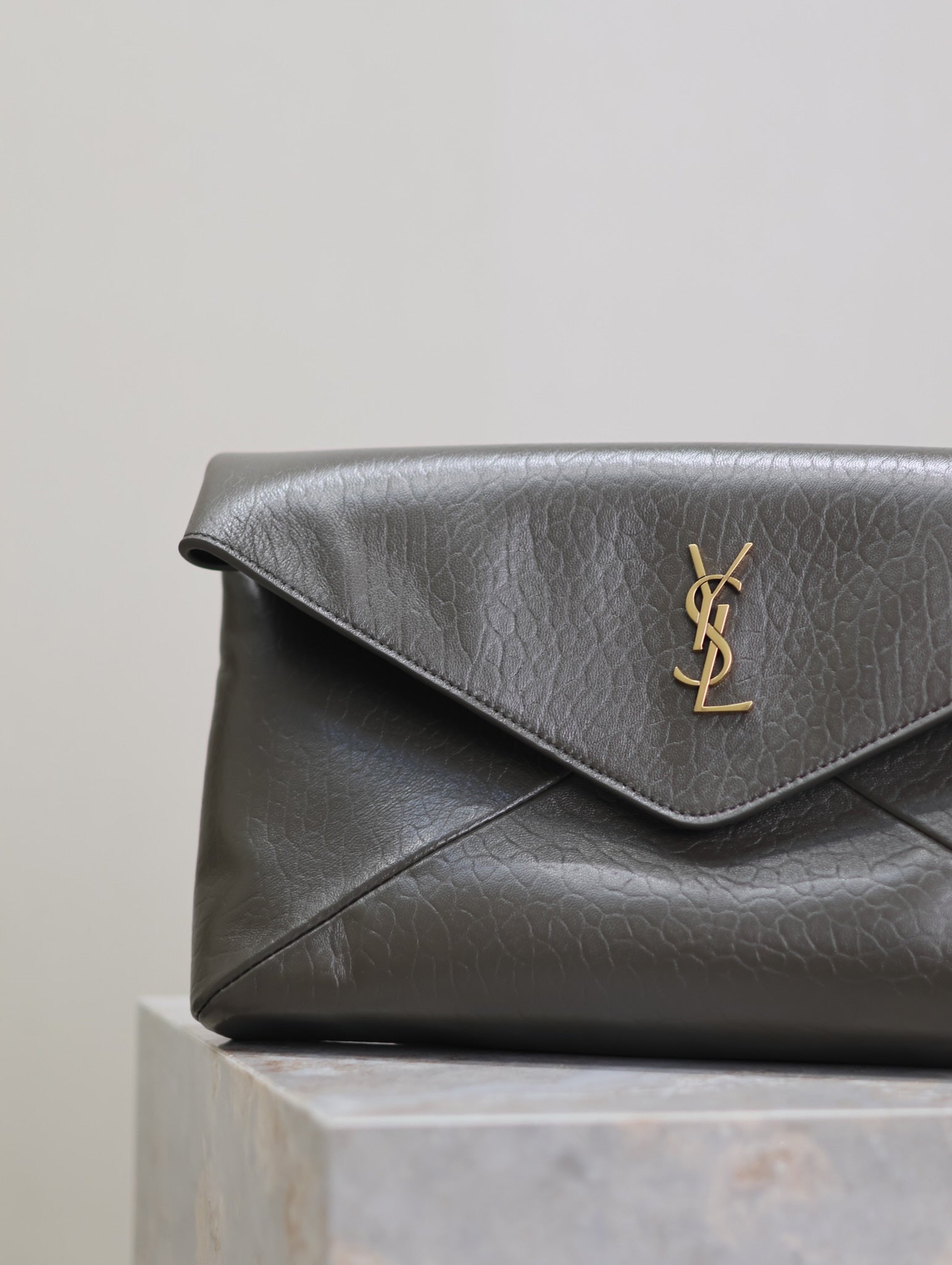 SAINT LAURENT ENVELOPE CLUTCH 29 IN KOMBU GREEN LAMBSKIN COPPER LOGO