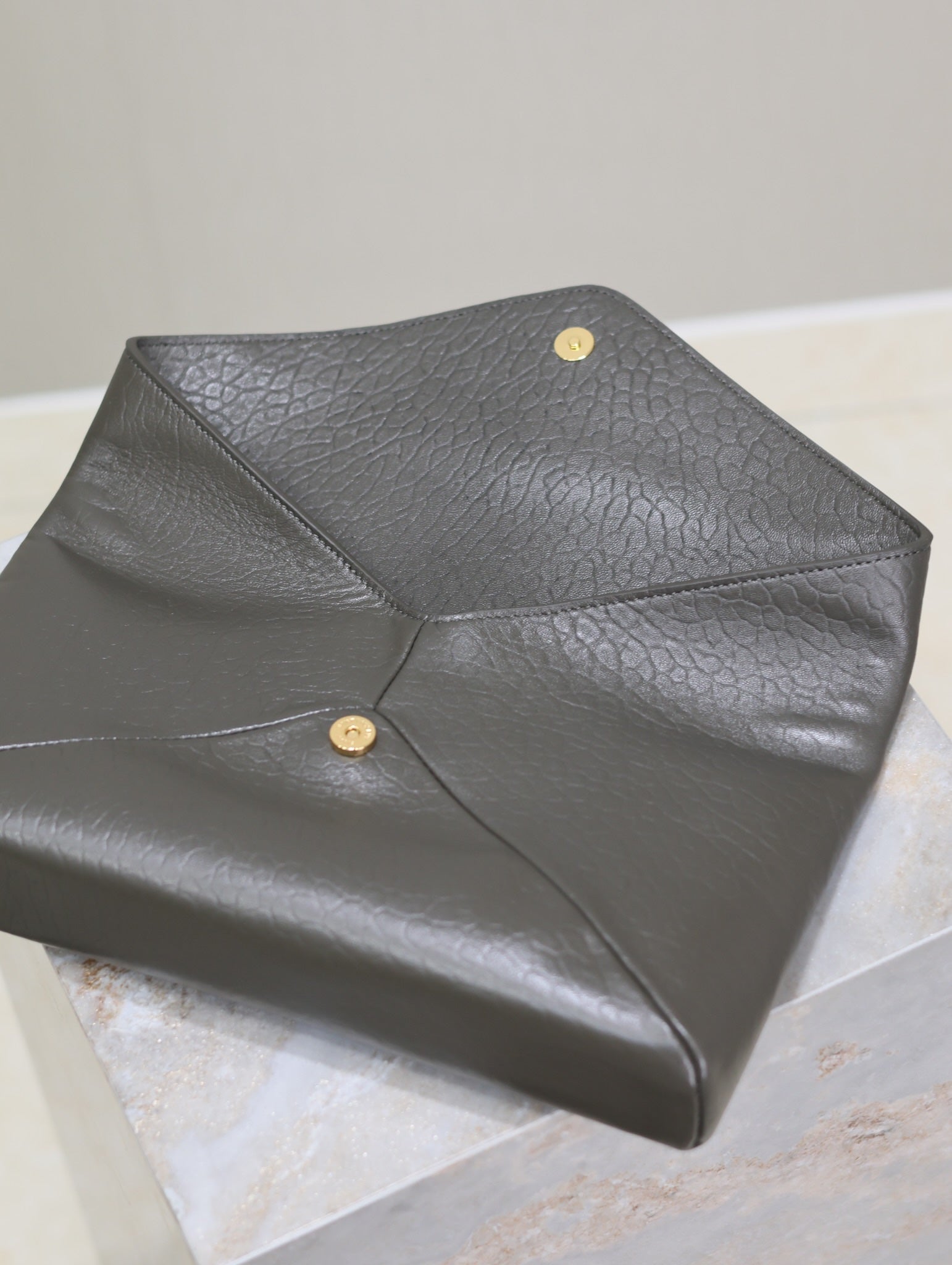SAINT LAURENT ENVELOPE CLUTCH 29 IN KOMBU GREEN LAMBSKIN COPPER LOGO