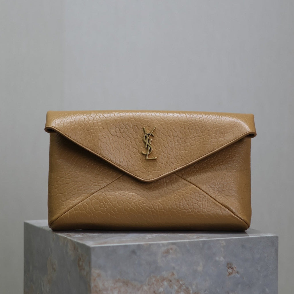 SAINT LAURENT ENVELOPE CLUTCH 29 IN EARTHY YELLOW LAMBSKIN COPPER LOGO