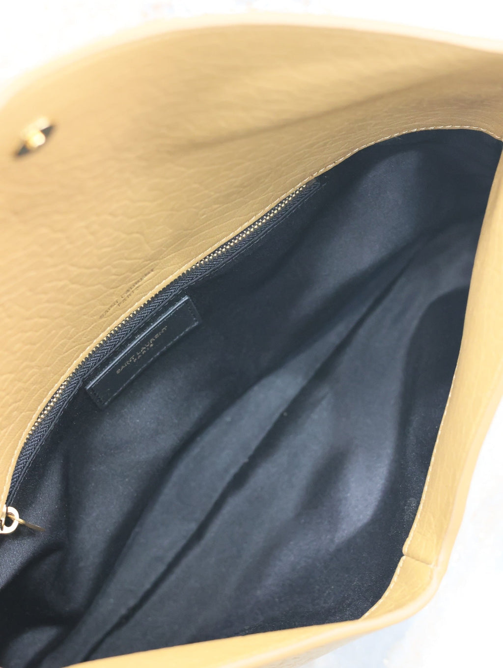 SAINT LAURENT ENVELOPE CLUTCH 29 IN EARTHY YELLOW LAMBSKIN COPPER LOGO
