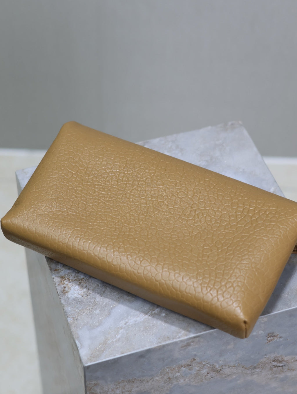 SAINT LAURENT ENVELOPE CLUTCH 29 IN EARTHY YELLOW LAMBSKIN COPPER LOGO