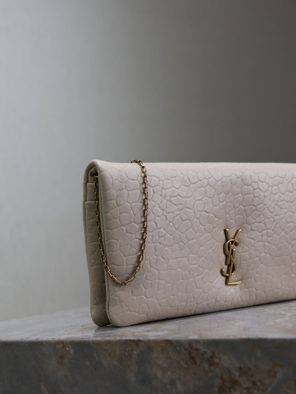 SAINT LAURENT CALYPSO POUCH 24 IN WHITE ELEPHANT TEXTURED LAMBSKIN GOLD LOGO