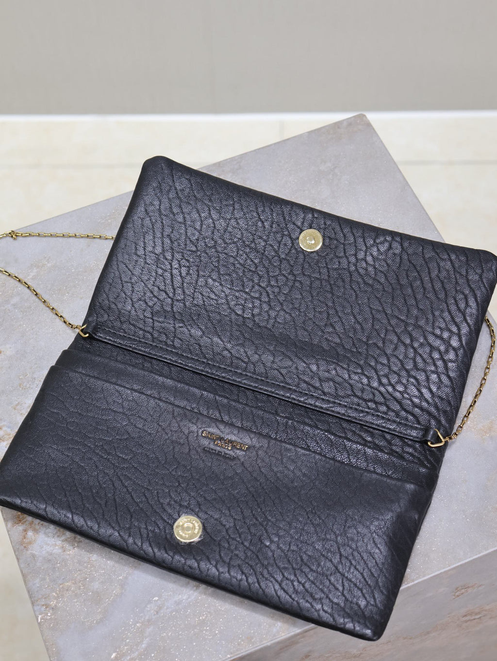 SAINT LAURENT CALYPSO POUCH 24 IN BLACK ELEPHANT TEXTURED LAMBSKIN GOLD LOGO