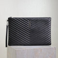 SAINT LAURENT CLUTCH 36 IN BLACK QUILTED CALFSKIN SILVER BUCKLE