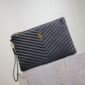 SAINT LAURENT CLUTCH 30 IN BLACK QUILTED CALFSKIN GOLD BUCKLE