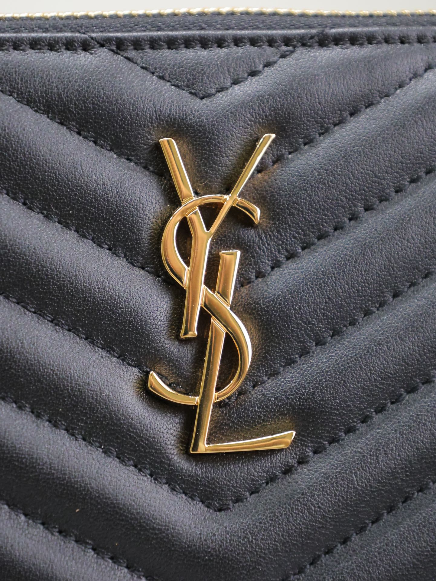 SAINT LAURENT CLUTCH 24 IN BLACK QUILTED CALFSKIN GOLD BUCKLE