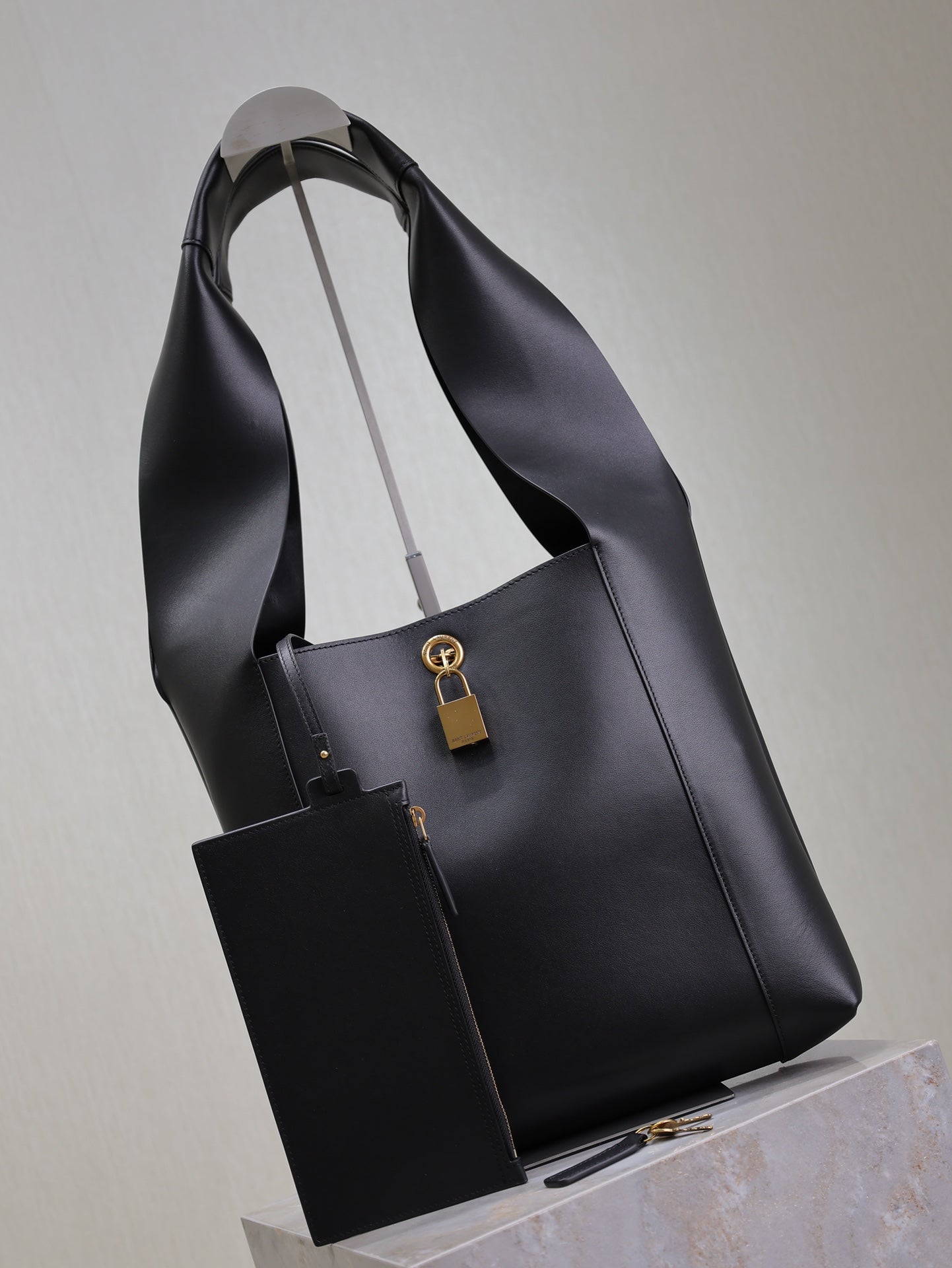 SAINT LAURENT TANGER HOBO BAG 27 IN BLACK CALFSKIN