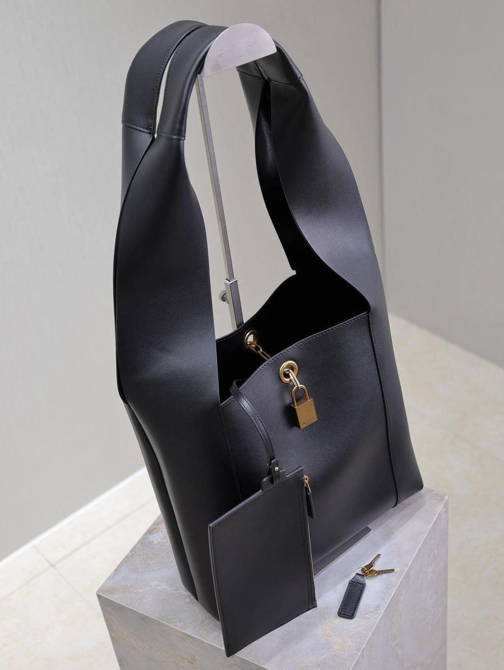 SAINT LAURENT TANGER HOBO BAG 27 IN BLACK CALFSKIN