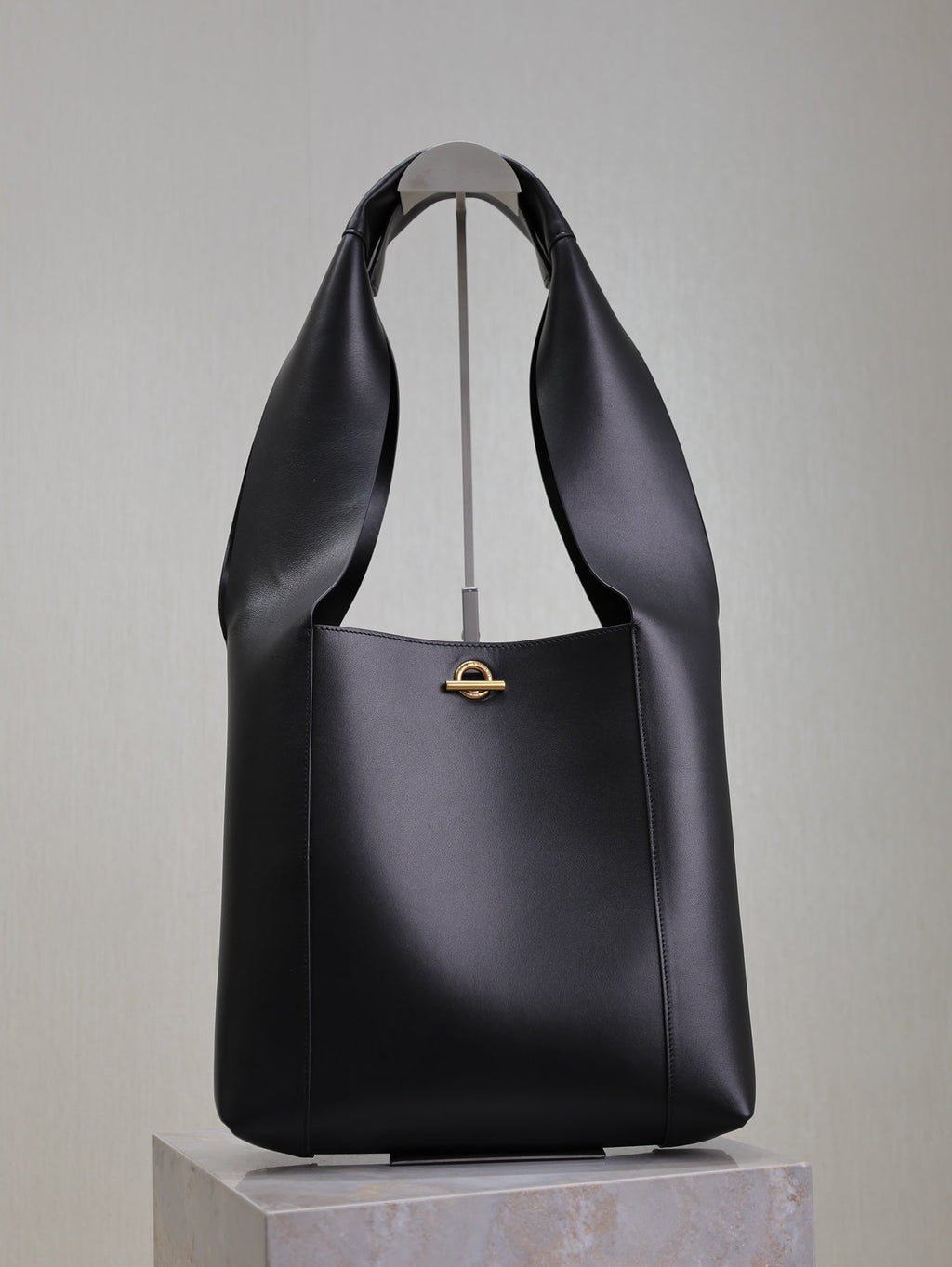 SAINT LAURENT TANGER HOBO BAG 27 IN BLACK CALFSKIN