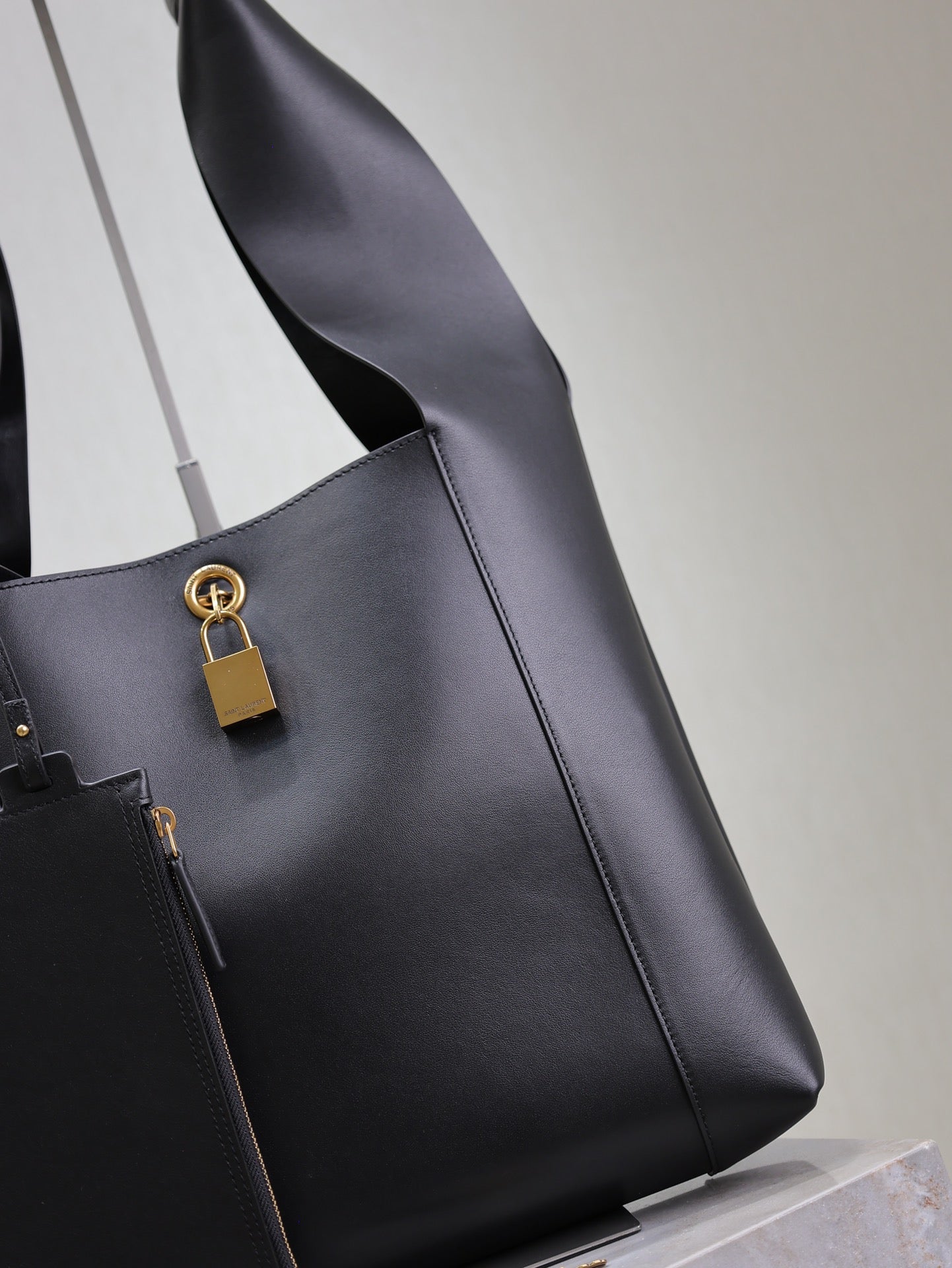 SAINT LAURENT TANGER HOBO BAG 27 IN BLACK CALFSKIN
