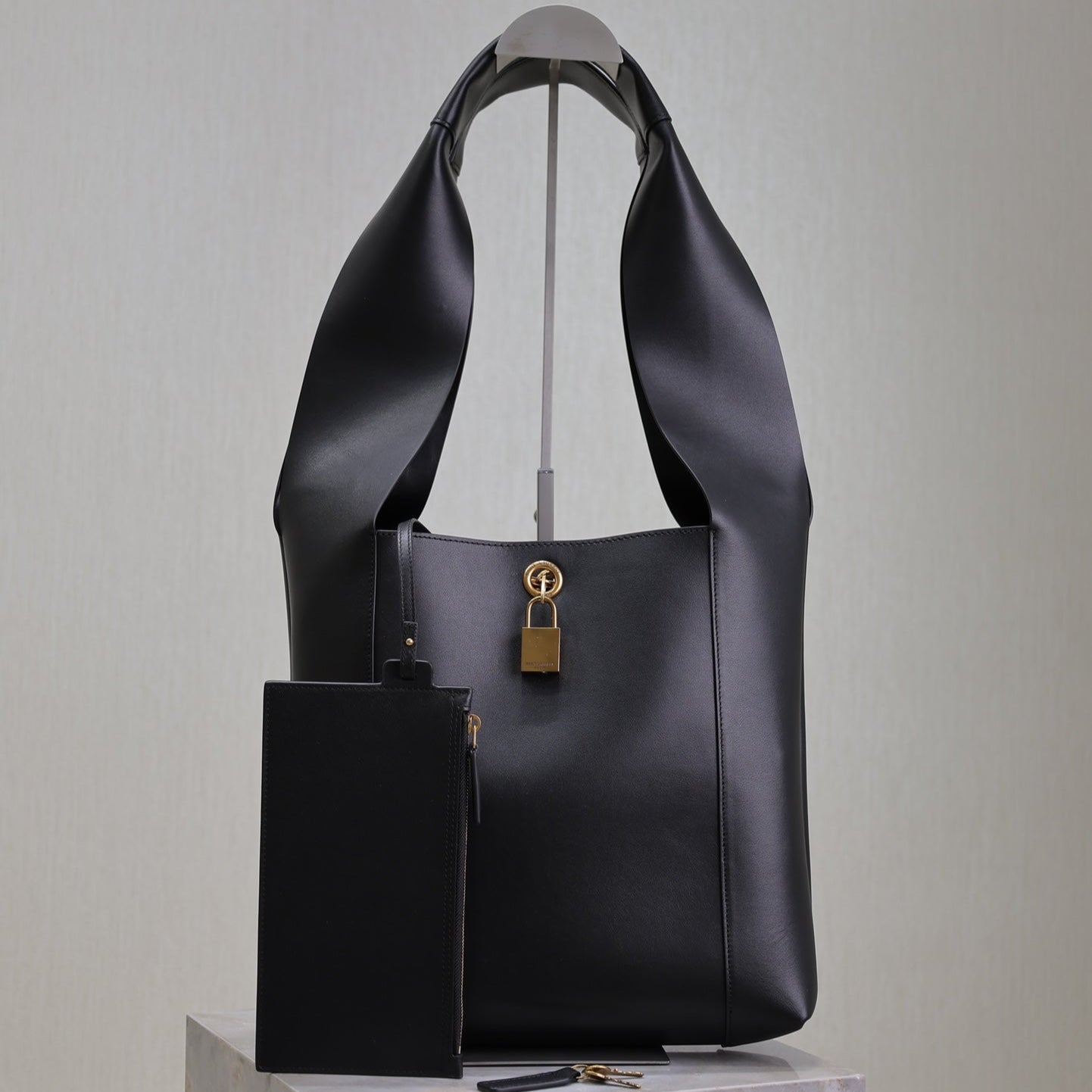 SAINT LAURENT TANGER HOBO BAG 27 IN BLACK CALFSKIN
