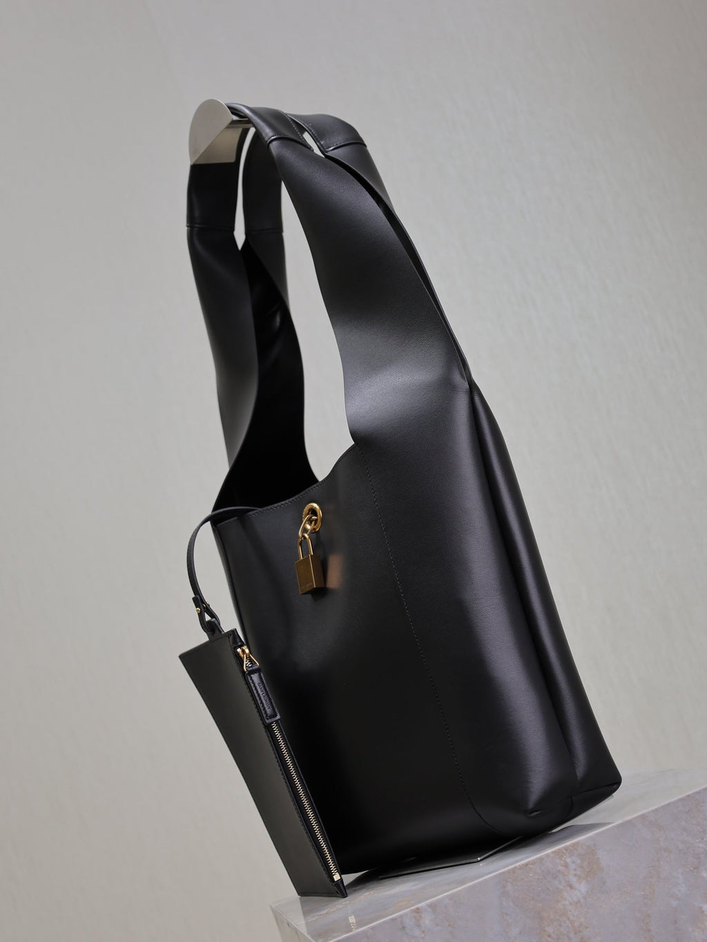 SAINT LAURENT TANGER HOBO BAG 27 IN BLACK CALFSKIN