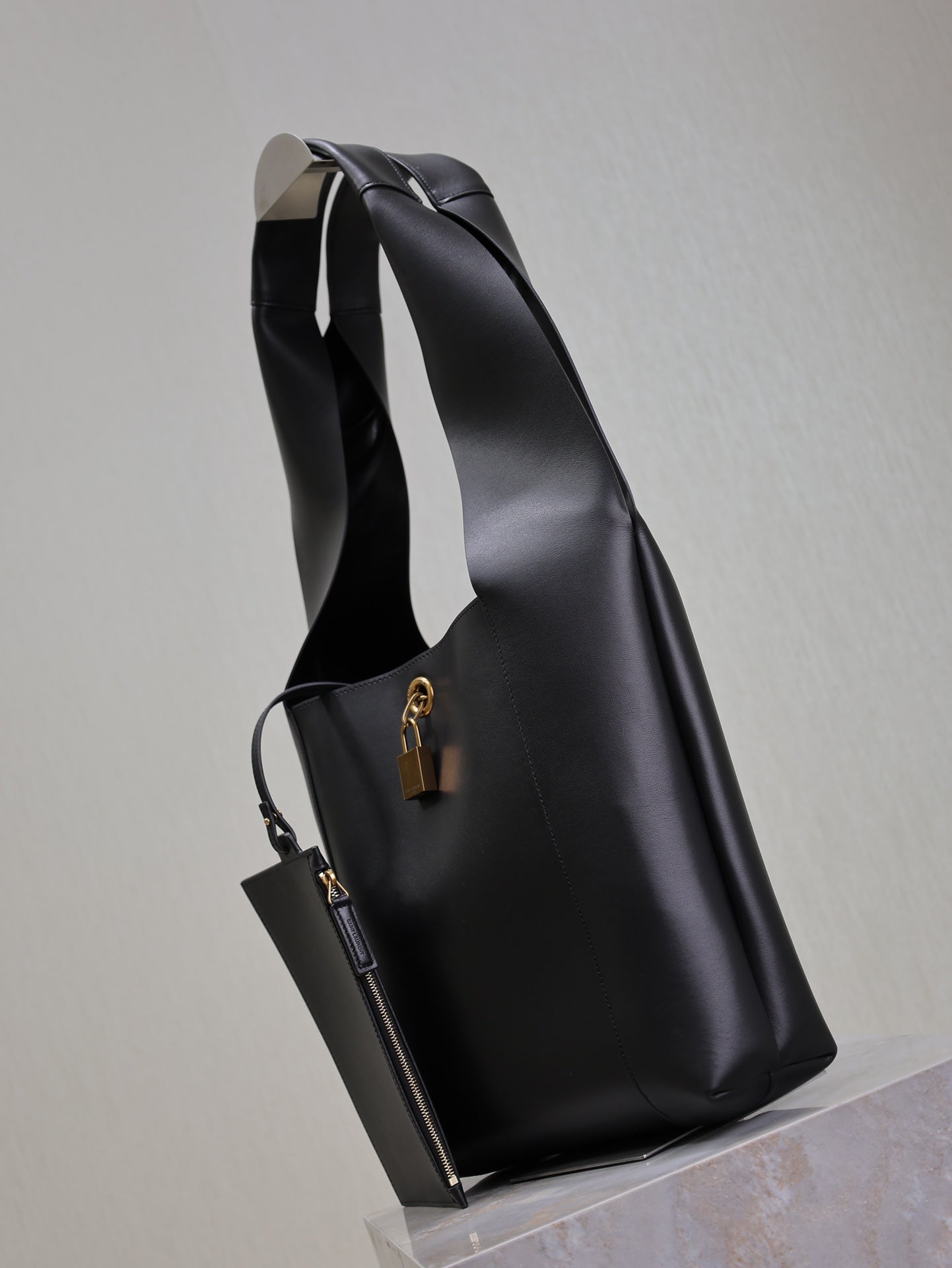 SAINT LAURENT TANGER HOBO BAG 27 IN BLACK CALFSKIN