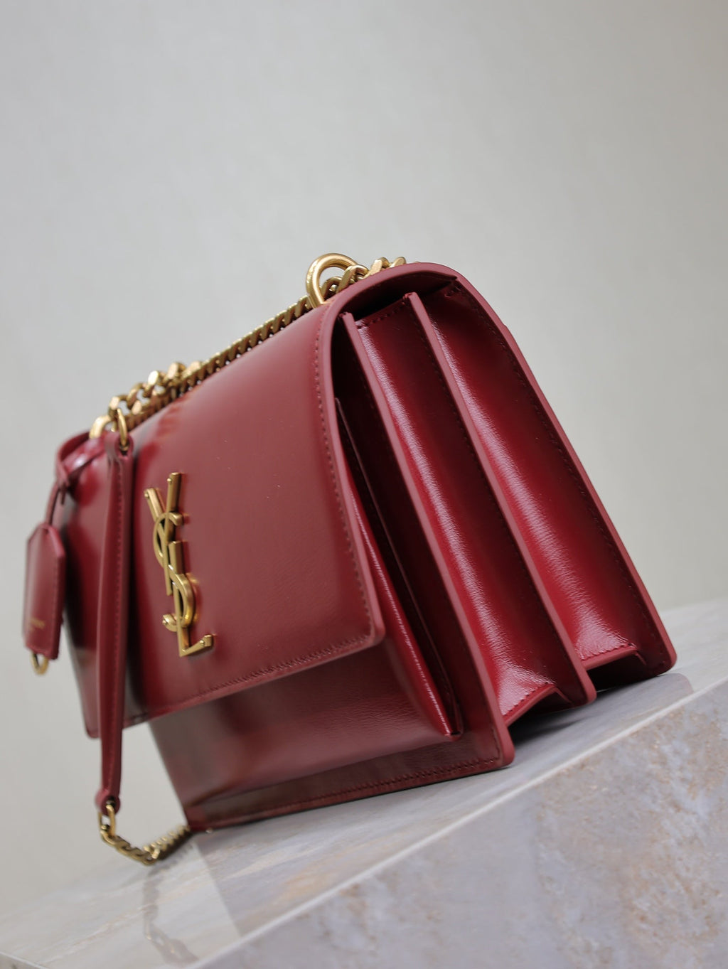 SAINT LAURENT YSL 25S SUNSET BAG 22 IN CRIMSON RED CALFSKIN GOLD HARDWARE