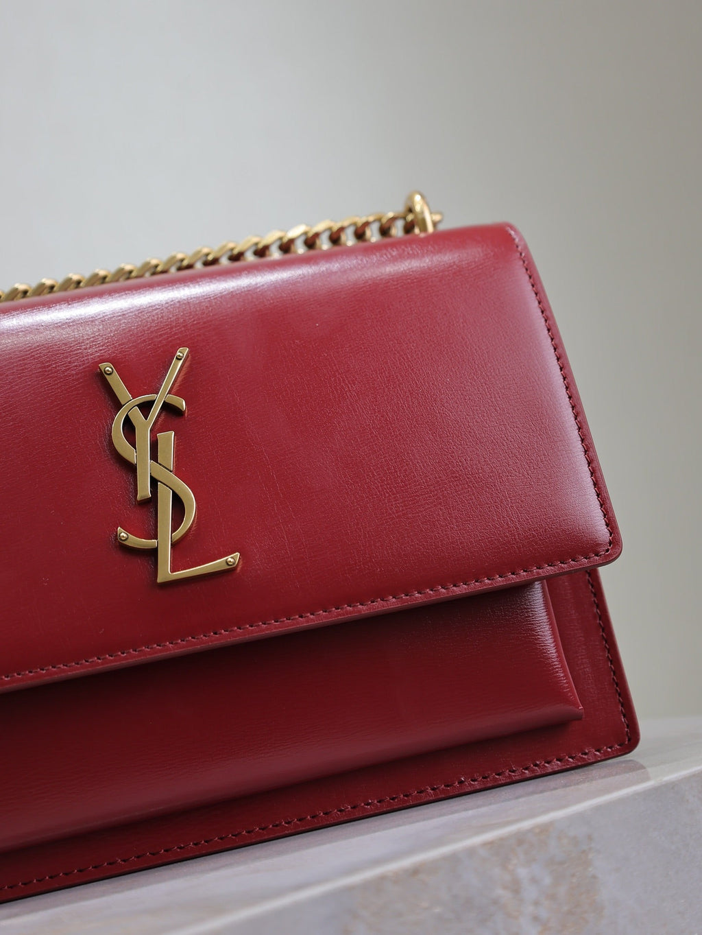 SAINT LAURENT YSL 25S SUNSET BAG 22 IN CRIMSON RED CALFSKIN GOLD HARDWRE