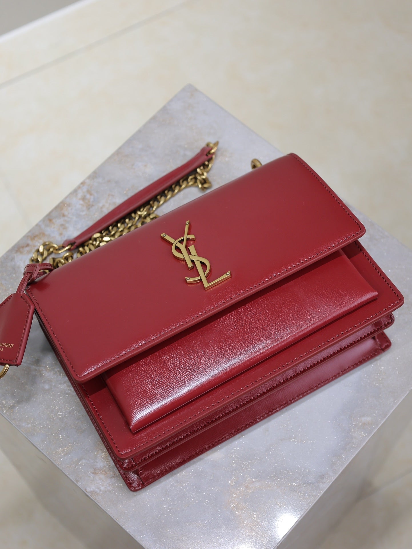 SAINT LAURENT YSL 25S SUNSET BAG 22 IN CRIMSON RED CALFSKIN GOLD HARDWRE