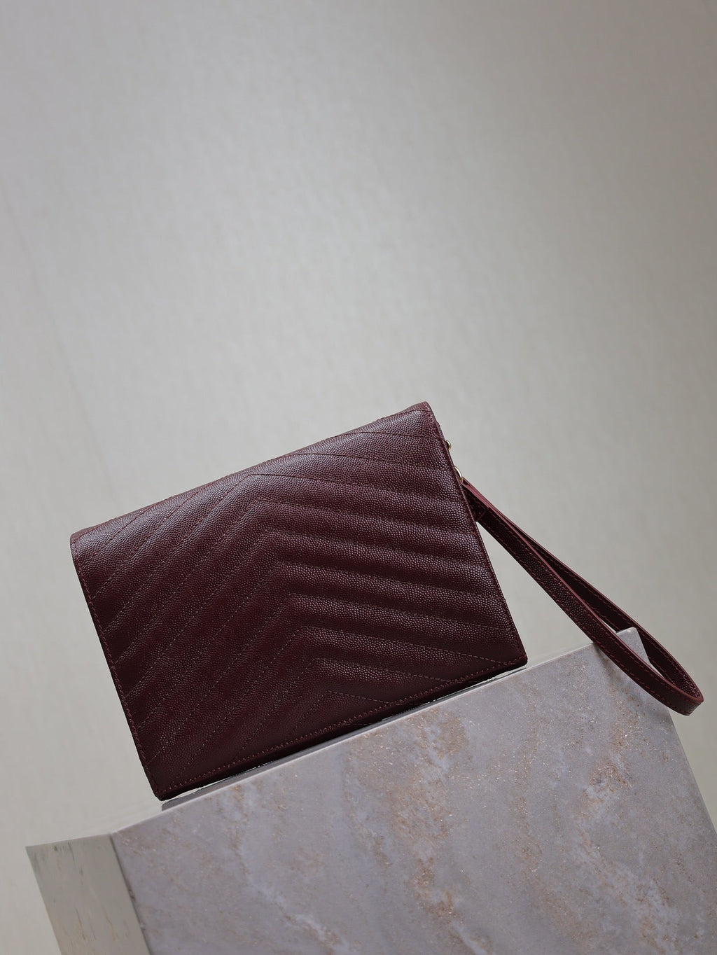 SAINT LAURENT CASSANDRE CLUTCH 21 IN BORDEAUX RED LAMBSKIN GOLD HARDWARE