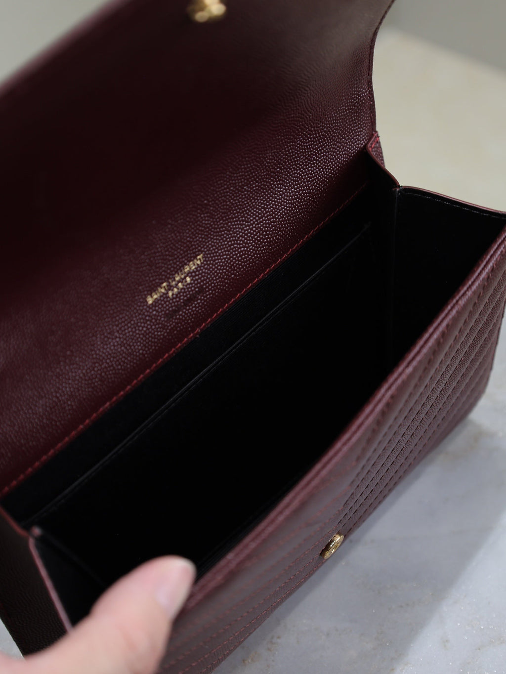 SAINT LAURENT CASSANDRE CLUTCH 21 IN BORDEAUX RED LAMBSKIN GOLD HARDWARE