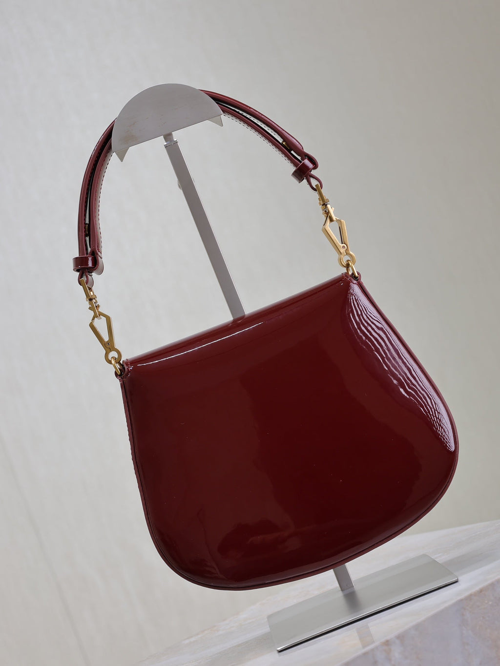 SAINT LAURENT VOLTAIRE SADDLE BAG 21 IN BORDEAUX RED PATENT CALFSKIN