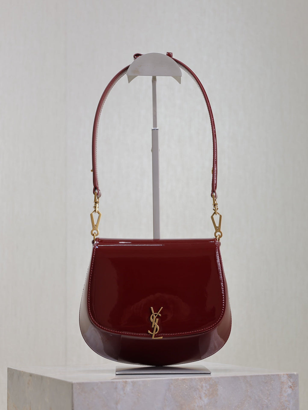 SAINT LAURENT VOLTAIRE SADDLE BAG 21 IN BORDEAUX RED PATENT CALFSKIN