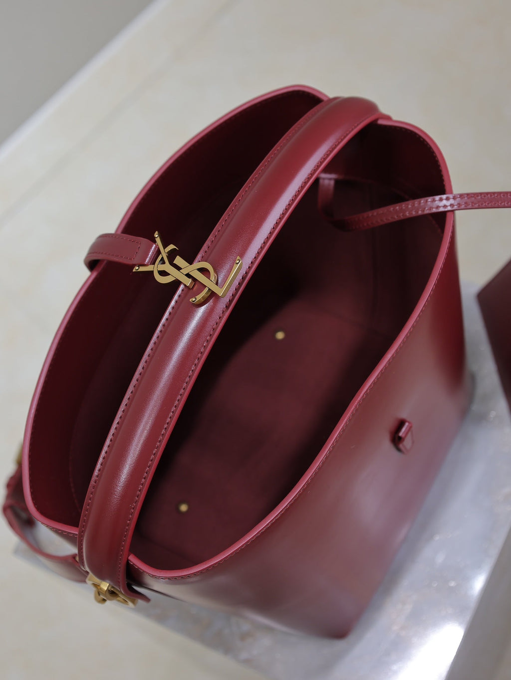 SAINT LAURENT YSL 25S LE 5 À 7 BUCKET 26 IN DARK BURGUNDY CALFSKIN GOLD HARDWRE