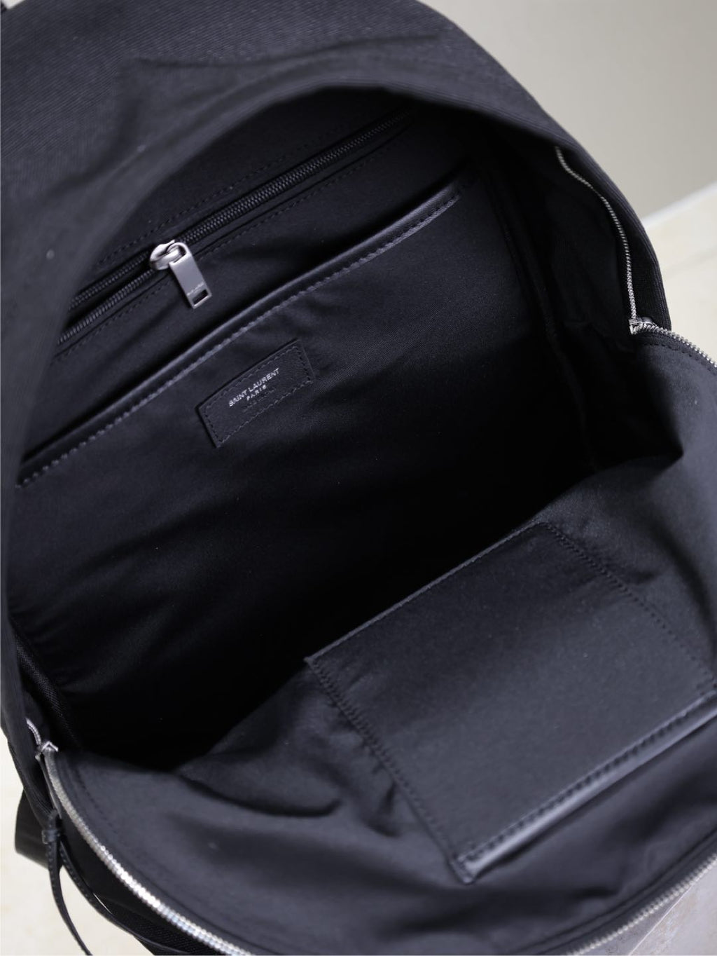SAINT LAURENT CITY BACKPACK 38 IN BLACK CANVAS WITH WHITE EMBROIDED LOGO