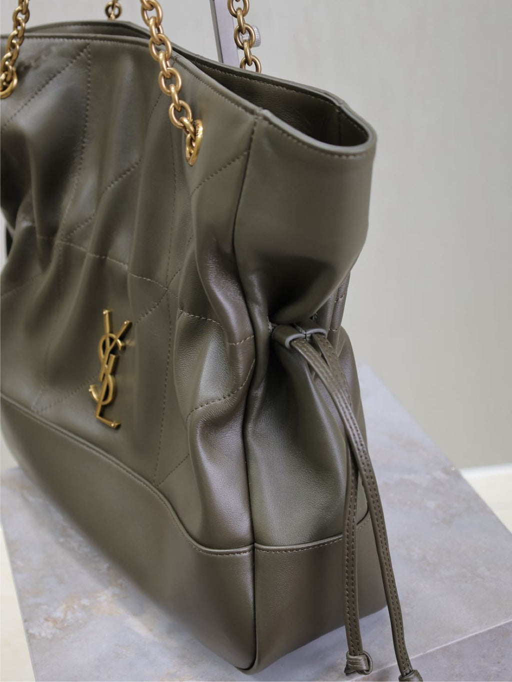 SAINT LAURENT JAMIE LARGE POCHON 34 IN UNIFORM GREEN LAMBSKIN COPPER HARDWARE