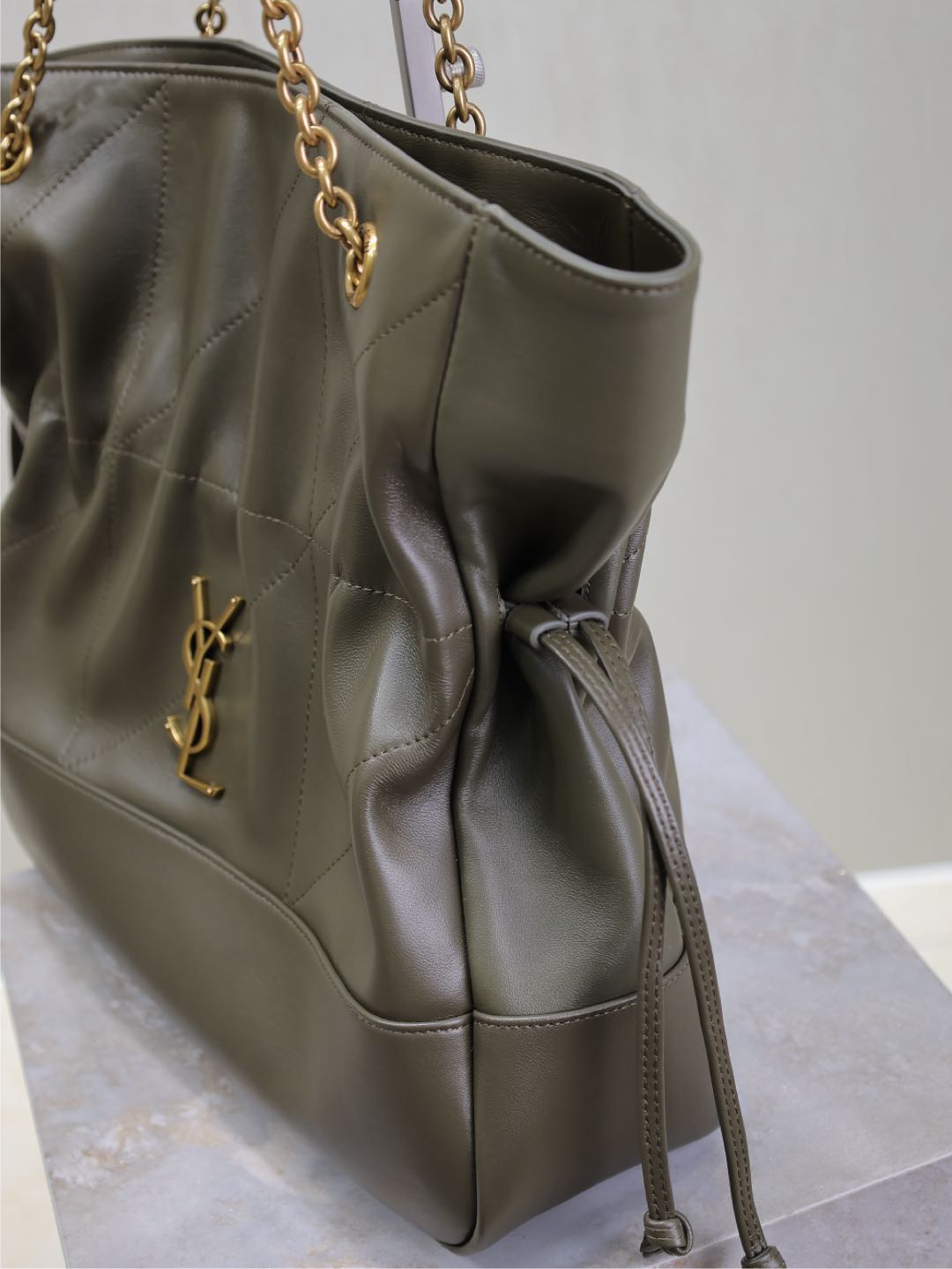 SAINT LAURENT JAMIE LARGE POCHON 34 IN UNIFORM GREEN LAMBSKIN COPPER HARDWARE