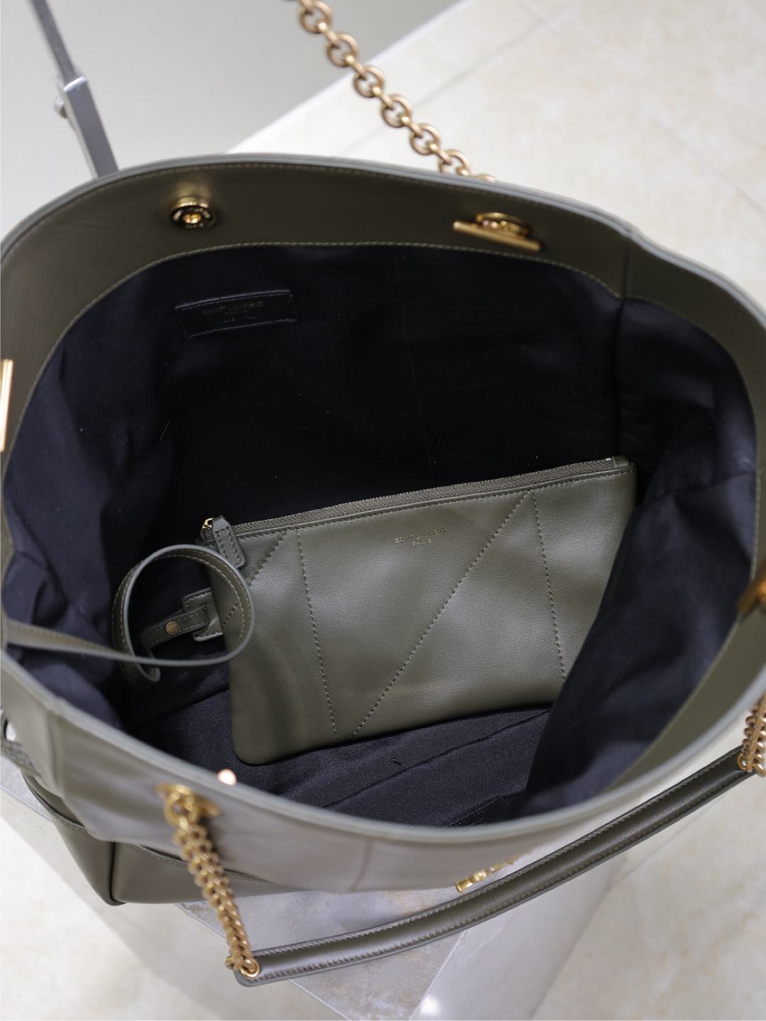 SAINT LAURENT JAMIE LARGE POCHON 34 IN UNIFORM GREEN LAMBSKIN COPPER HARDWARE
