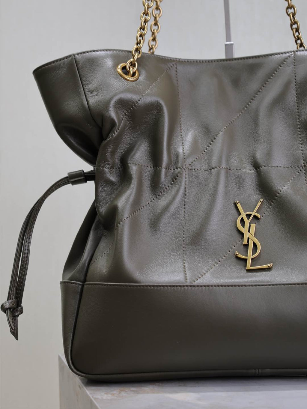 SAINT LAURENT JAMIE LARGE POCHON 34 IN UNIFORM GREEN LAMBSKIN COPPER HARDWARE
