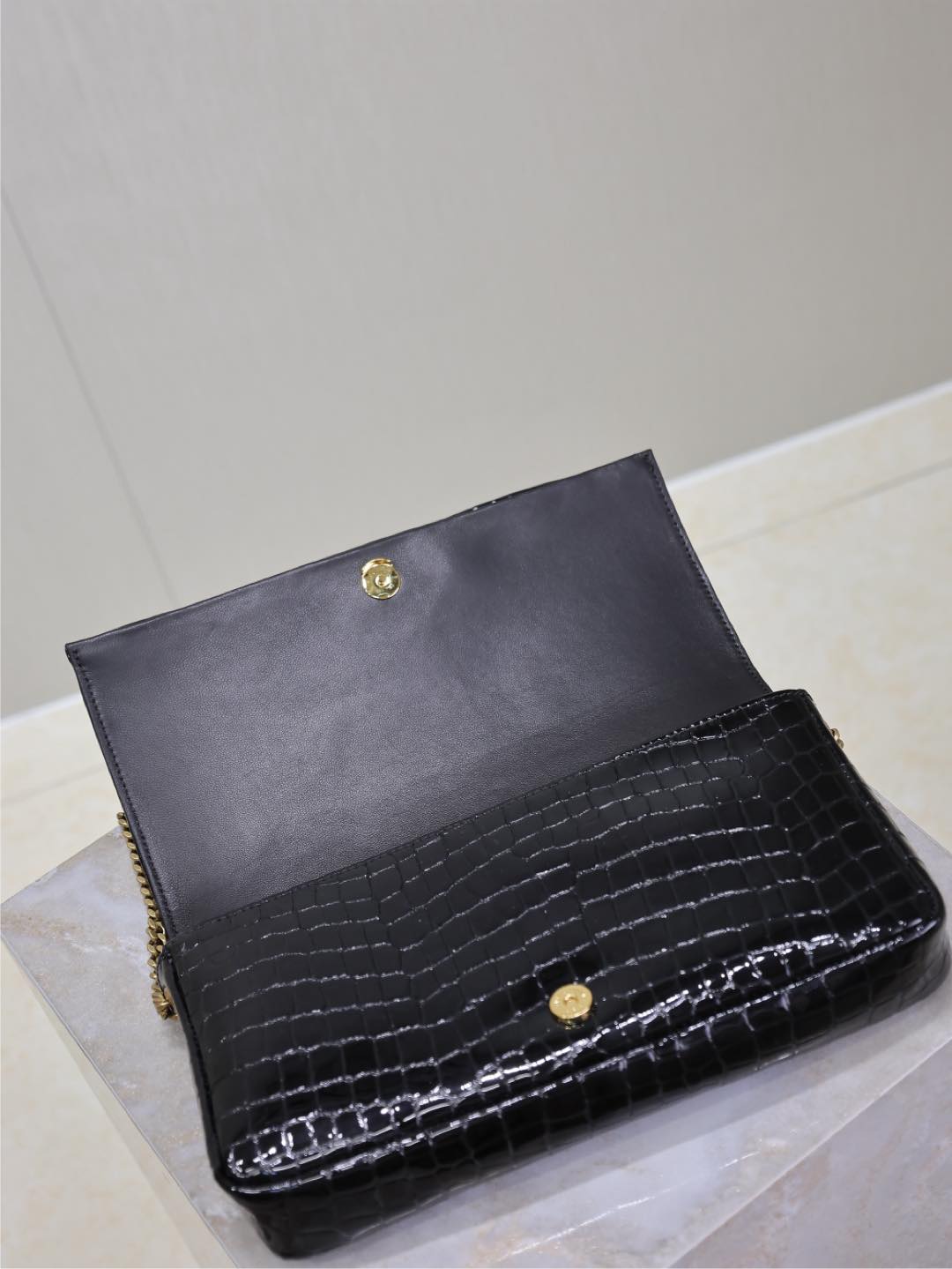 SAINT LAURENT KATE 99 MEDIUM BAG 26 IN BLACK CROCODILE-EMBOSSED CALFSKIN COPPER HARDWARE