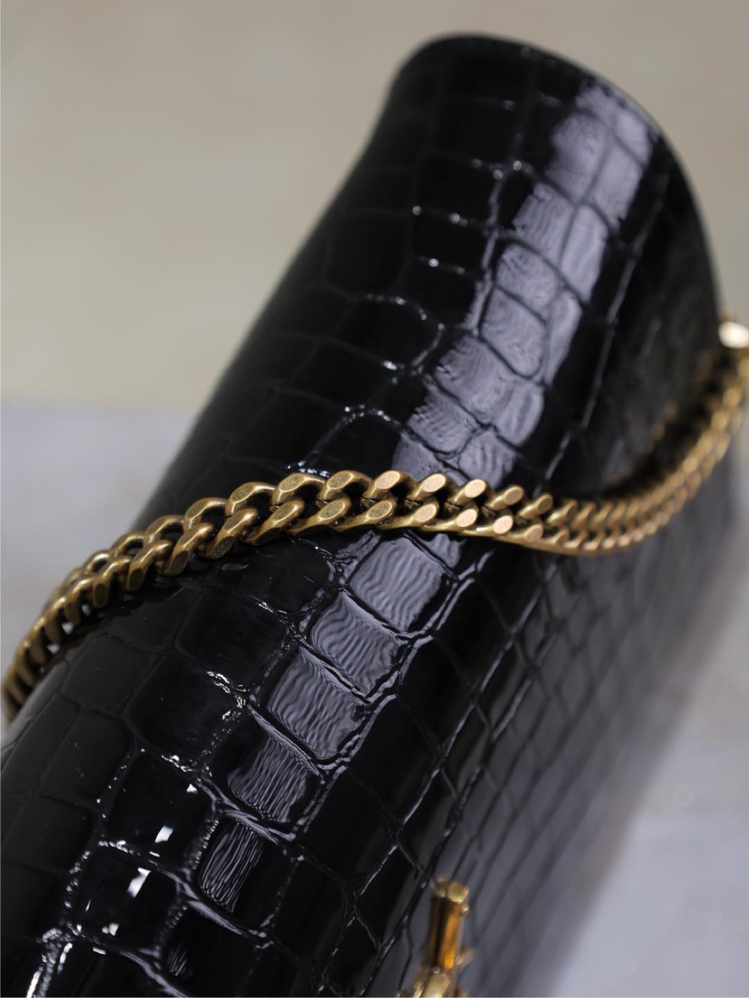 SAINT LAURENT KATE 99 MEDIUM BAG 26 IN BLACK CROCODILE-EMBOSSED CALFSKIN COPPER HARDWARE