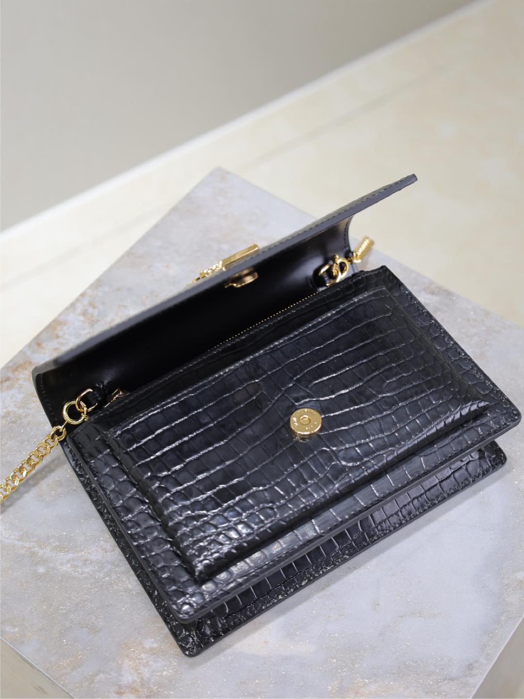 SAINT LAURENT SUNSET SMALL BAG 19 IN BLACK CROCODILE-EMBOSSED CALFSKIN COPPER HARDWARE