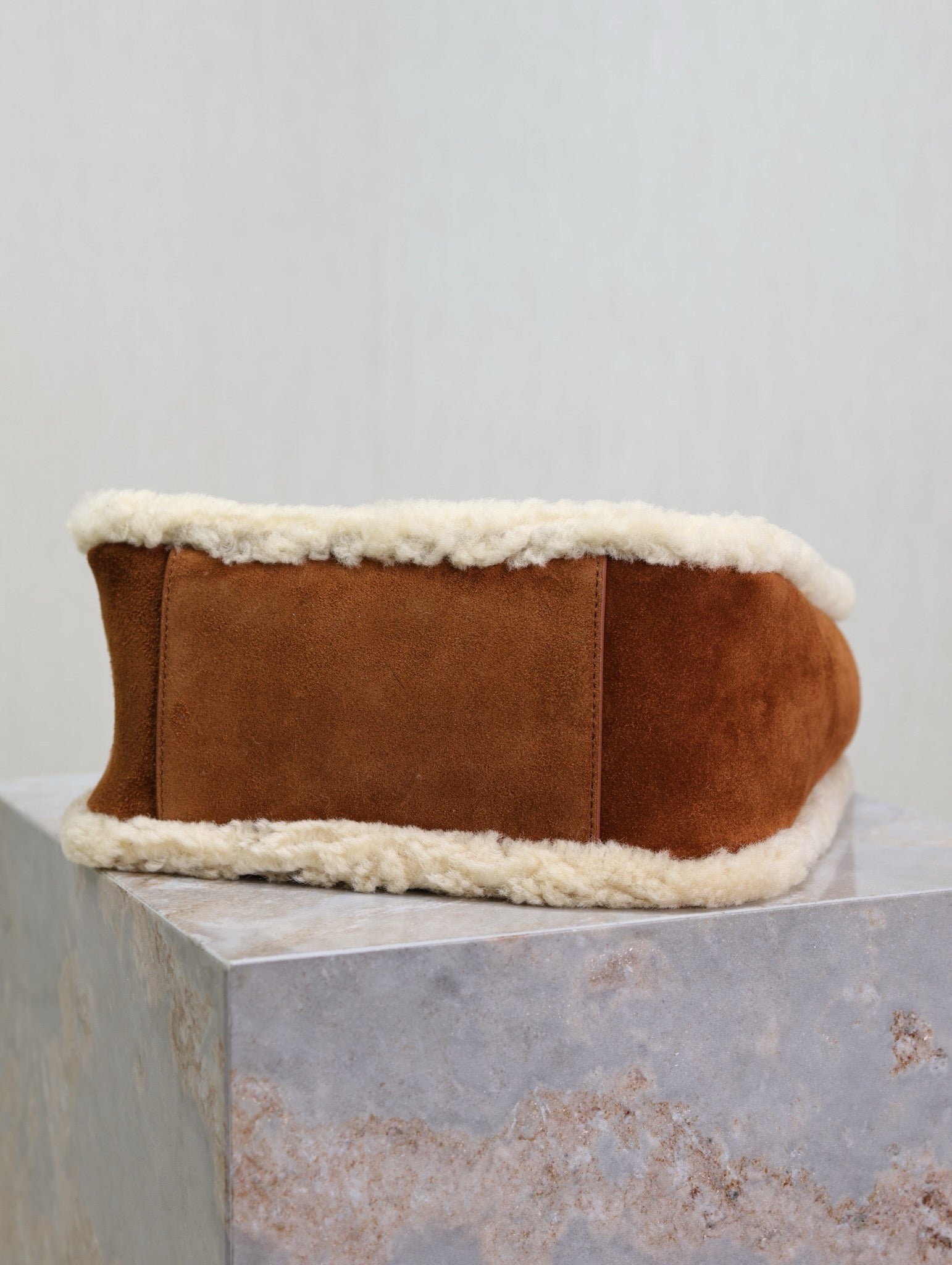 SAINT LAURENT LE 5 À 7 SMALL SUPPLE 23 IN AMBER ORANGE SUEDE AND WHITE LAMB FUR TRIM