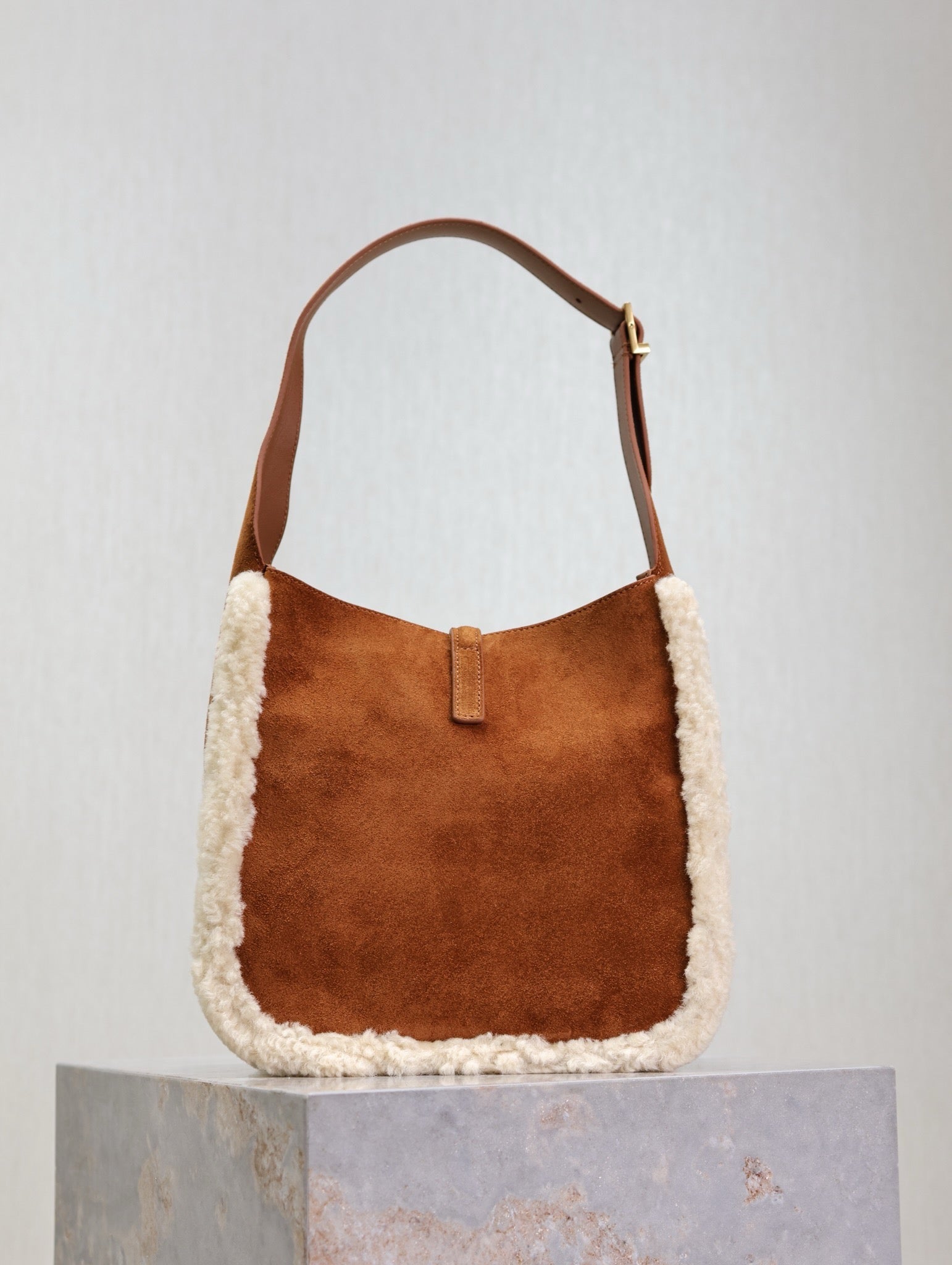 SAINT LAURENT LE 5 À 7 SMALL SUPPLE 23 IN AMBER ORANGE SUEDE AND WHITE LAMB FUR TRIM