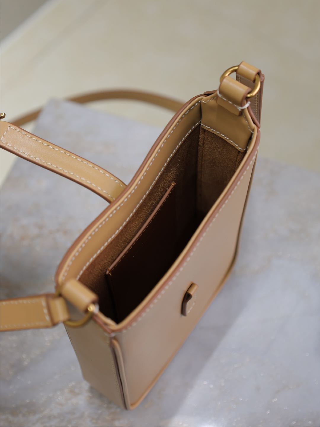 SAINT LAURENT LE 5 À 7 PHONE BAG 18 IN CIDER BROWN CALFSKIN