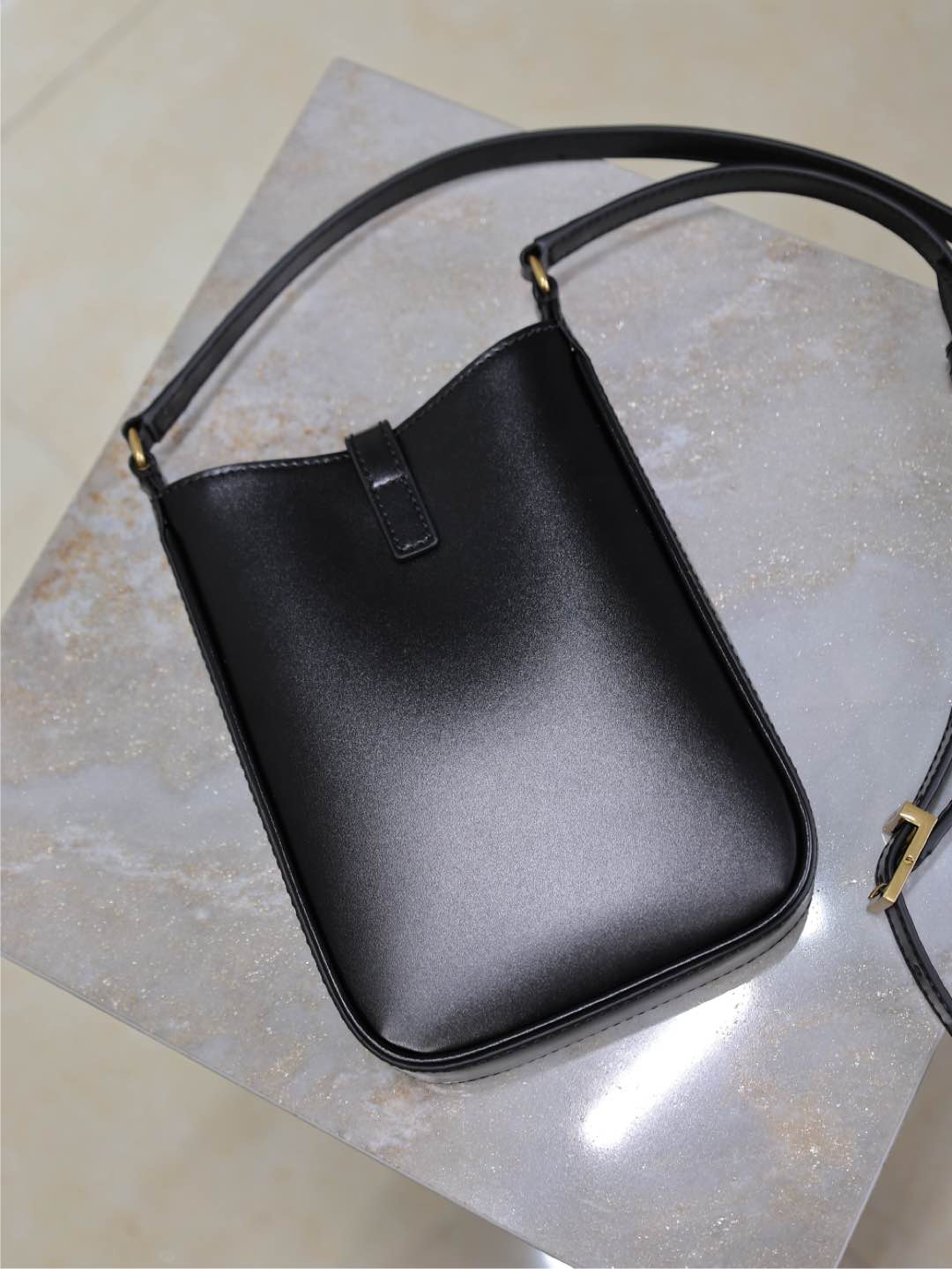 SAINT LAURENT LE 5 À 7 PHONE BAG 18 IN BLACK CALFSKIN