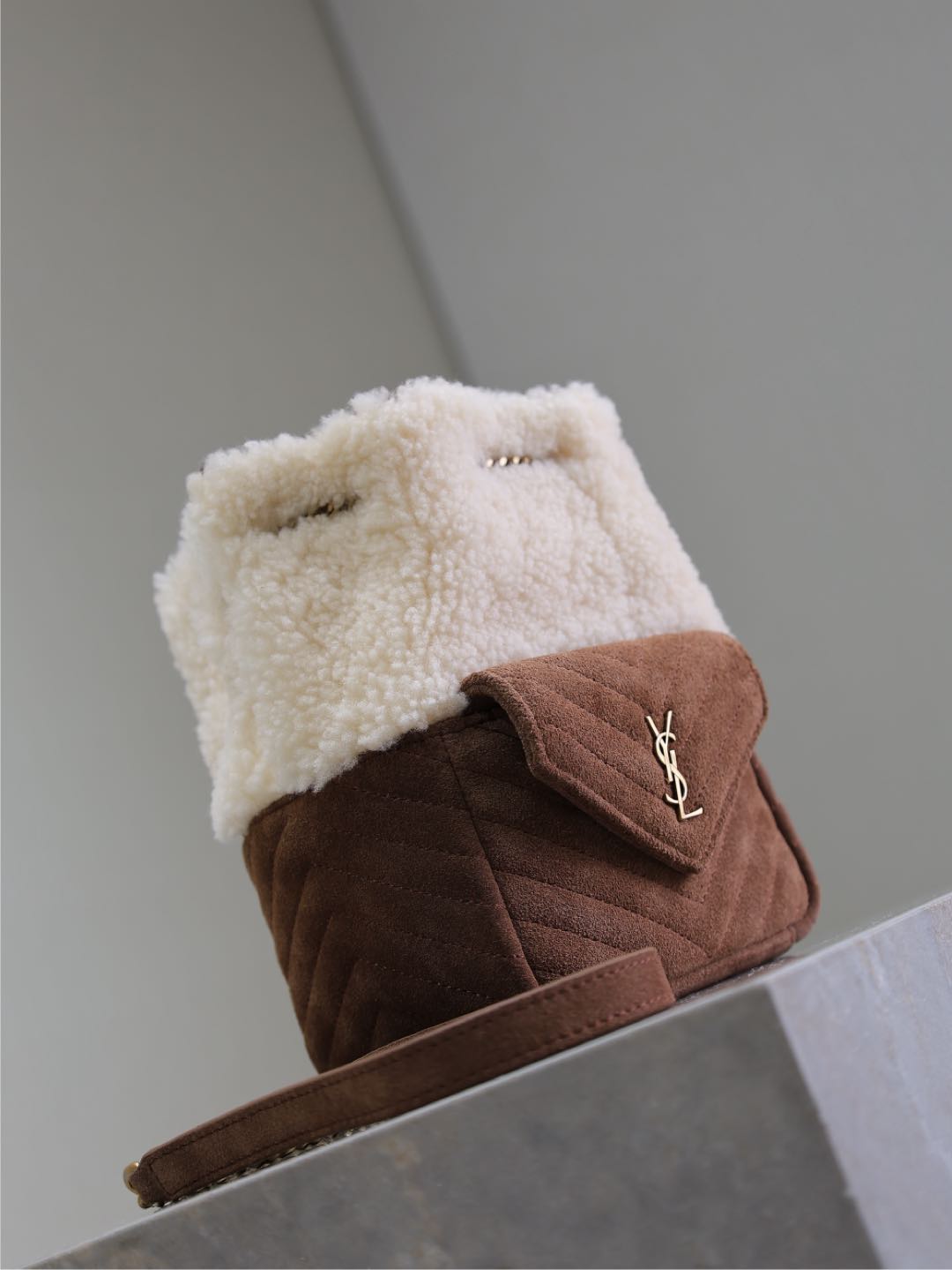 SAINT LAURENT JOE MINI BUCKET BAG 19 IN WHITE SHEARLING AND BROWN SUEDE