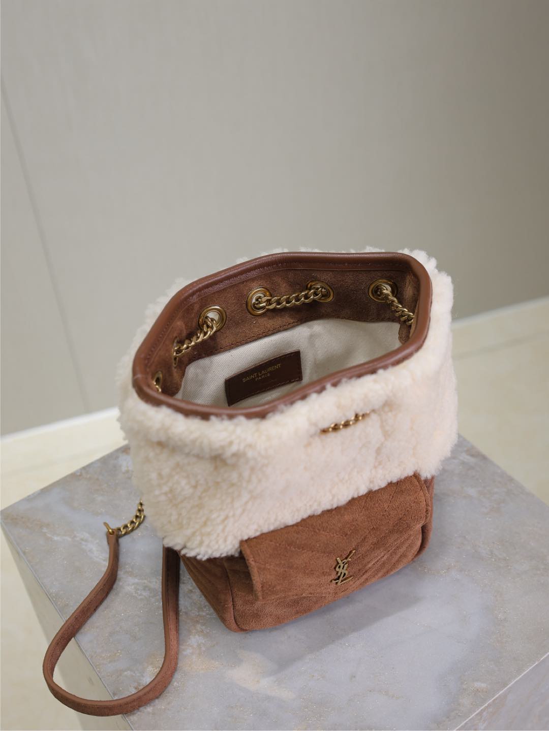 SAINT LAURENT JOE MINI BUCKET BAG 19 IN WHITE SHEARLING AND BROWN SUEDE