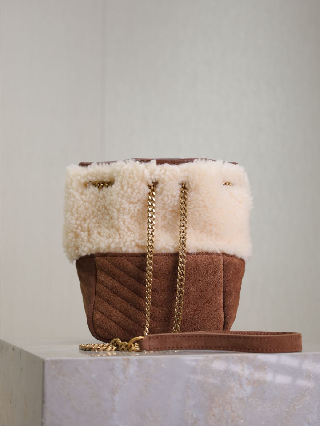 SAINT LAURENT JOE MINI BUCKET BAG 19 IN WHITE SHEARLING AND BROWN SUEDE